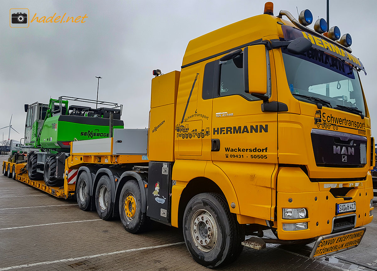 MAN TGX 41.540 (Maurer) from Hermann brings a Sennebogen